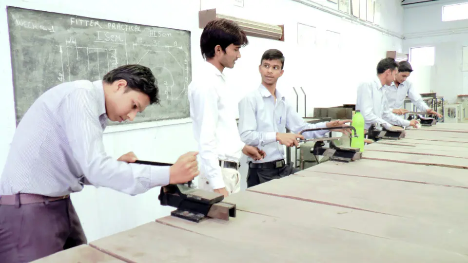 Fitter trade students practising at workshop benches at Navodya ITI Alwar
